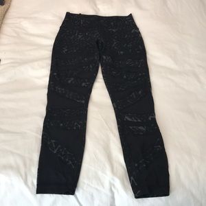 Black Lululemon leggings with mesh detail